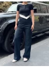 Kadın Bisiklet Yaka Asimetrik Kesim Atlet Detay Bluz Ve Yüksek Bel Bol Paça Pantolon Ikili Takım