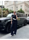 Kadın Bisiklet Yaka Asimetrik Kesim Atlet Detay Bluz Ve Yüksek Bel Bol Paça Pantolon Ikili Takım