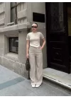 Kadın Bisiklet Yaka Asimetrik Kesim Atlet Detay Bluz Ve Yüksek Bel Bol Paça Pantolon Ikili Takım