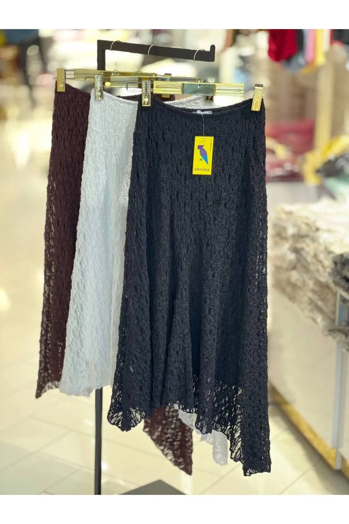 Kadın Yüksek Bel Beli Lastikli Asimetrik Kesim Dantelli Midi Boy Etek - Kahverengi