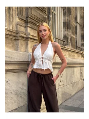 MetuCa Kadın Halter Yaka Boyundan ve Önden Bağlamalı Sırtı Açık Fırfırlı Crop Bluz - Beyaz