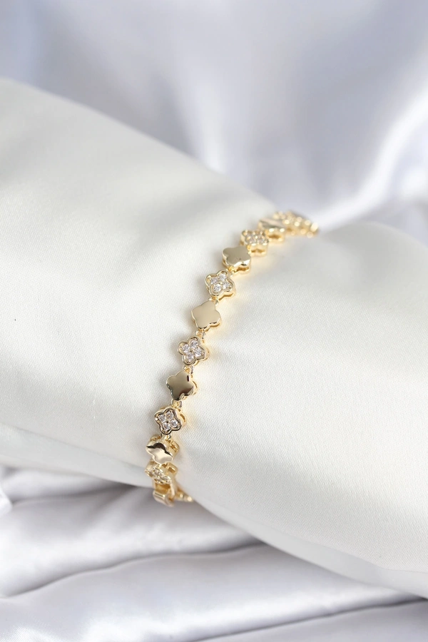 Pirinç Gold Renk Zirkon Taşlı Yonca Model Kadın Bileklik
