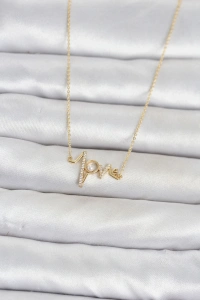 Pirinç Gold Renk Kalp Ritmi Model Kadın Kolye