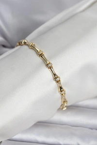 Pirinç Gold Renk Kemik Model Kadın Bileklik