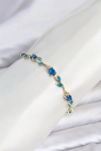Pirinç Gold Renk Mavi Zirkon Taşlı Çiçek Model Kadın Bileklik