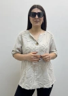 Kabartma Desenli Bej Rengi Müslin Bluz
