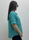 Kabartma Desenli Turkuaz Rengi Müslin Bluz