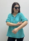 Kabartma Desenli Turkuaz Rengi Müslin Bluz