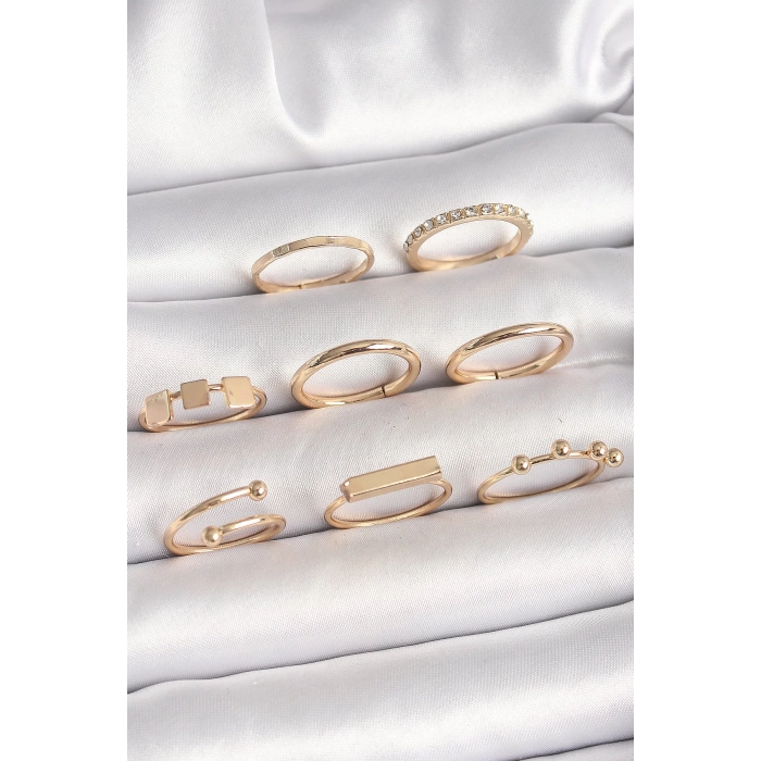 Pirinç Gold Renk Goemetrik Sembol Model Zirkon Taş Detaylı Kadın Yüzük Kombini