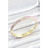 Mineli Pirinç Pembe Sarmal Desenli Gold Renk Kadın Kelepçe