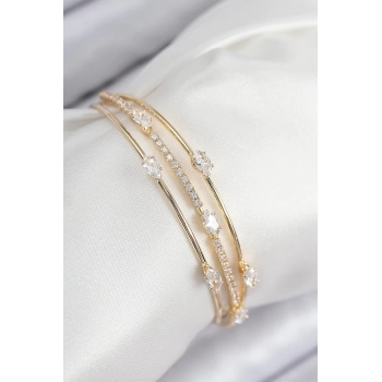 Pirinç Zirkon Taşlı Su Yolu Model Gold Renk Kadın Bileklik