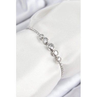 Pirinç Zirkon Taşlı Sıralı Daire Model Gümüş Renk Asansörlü Kadın Bileklik