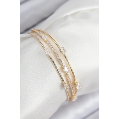 Pirinç Zirkon Taşlı Su Yolu Model Gold Renk Kadın Bileklik