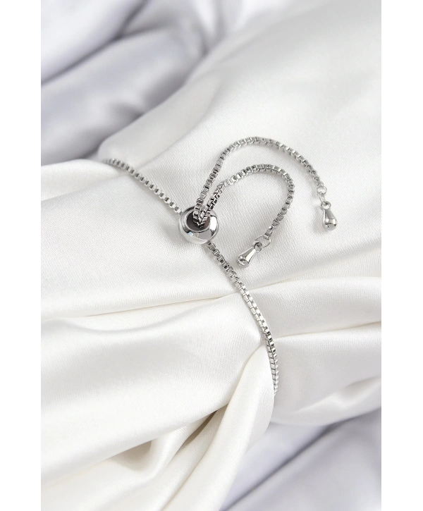 Pirinç Zirkon Taşlı X Detaylı Su Yolu Model Gümüş Renk Asansörlü Kadın Bileklik