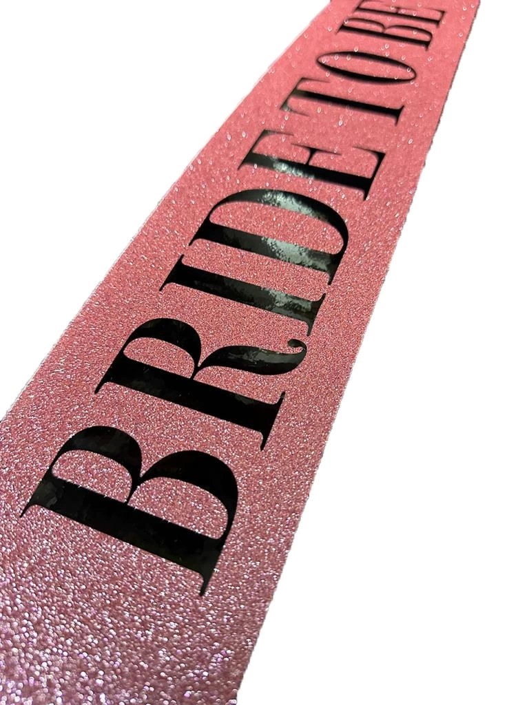 NessiWorld Pembe Üzeri Siyah Kalın Bride To Be Yazılı Simli Işıltılı Kuşak Kemer 10x80 cm