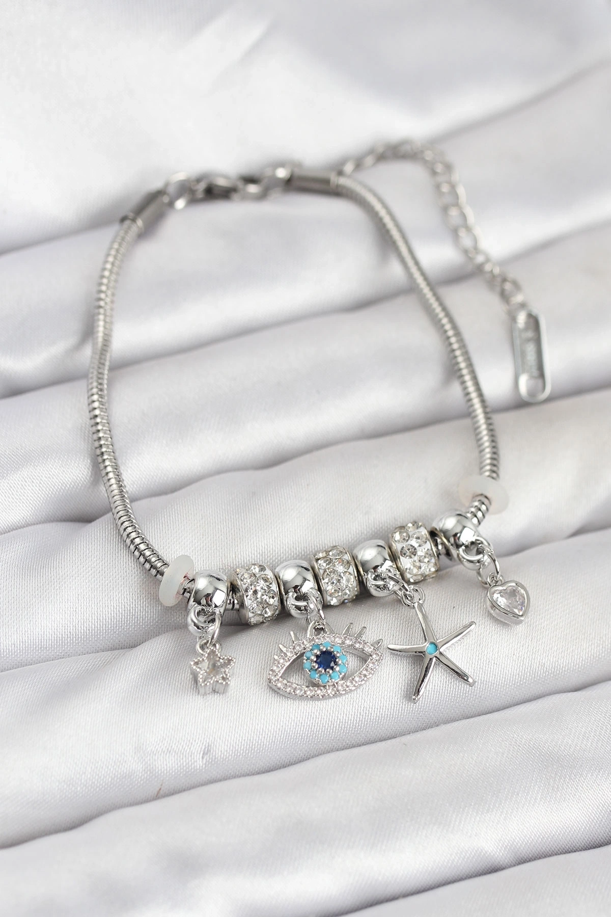 Pirinç Gümüş Renk Göz Model Charmlı Kadın Bileklik