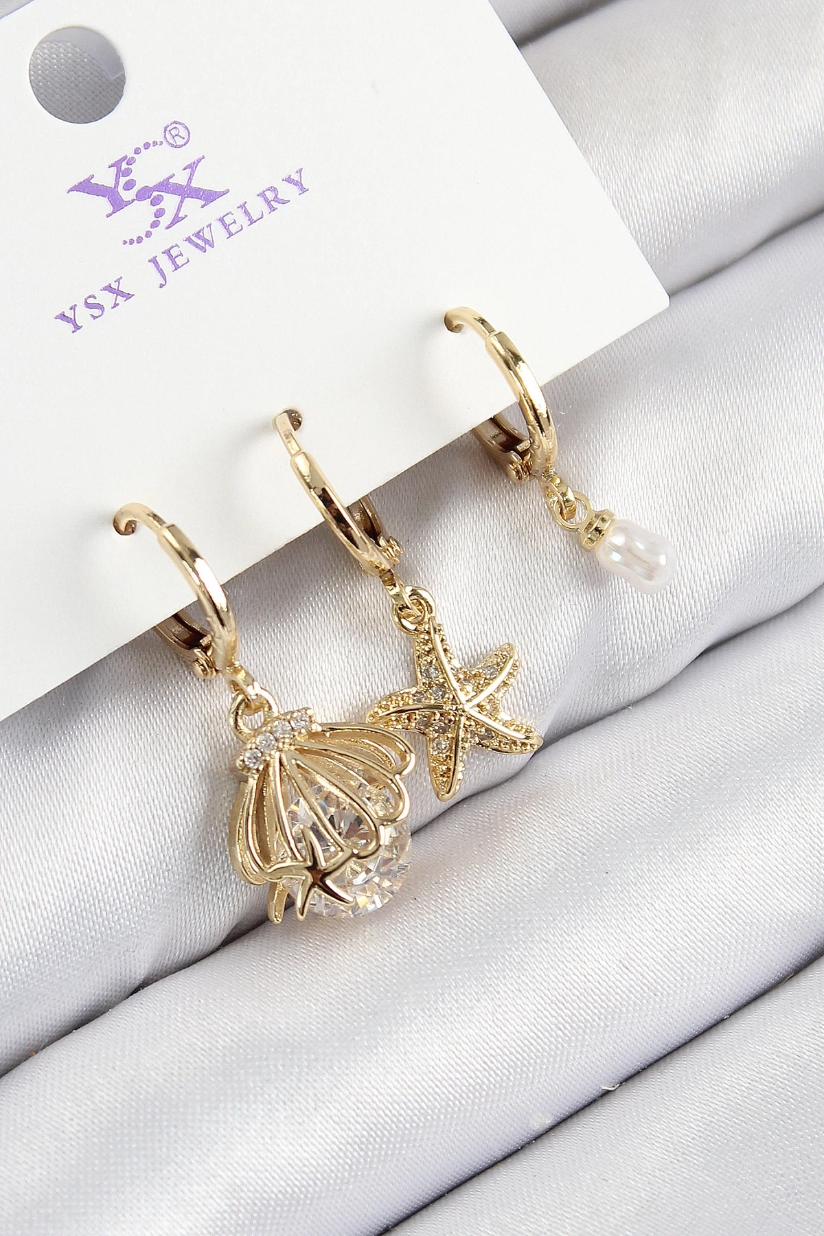 Pirinç Zirkon Taşlı 3lü İstiridye Ve Yıldız Model Gold Renk Kadın Küpe