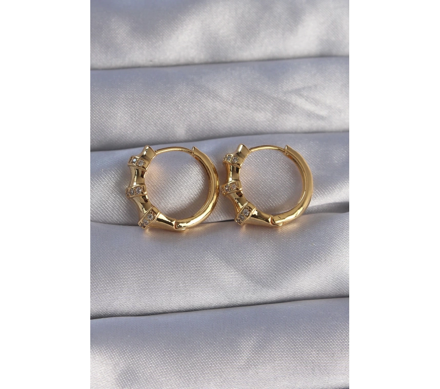Pirinç Gold Renk Kabartmalı Zirkon Taşlı Oval Model Küpe