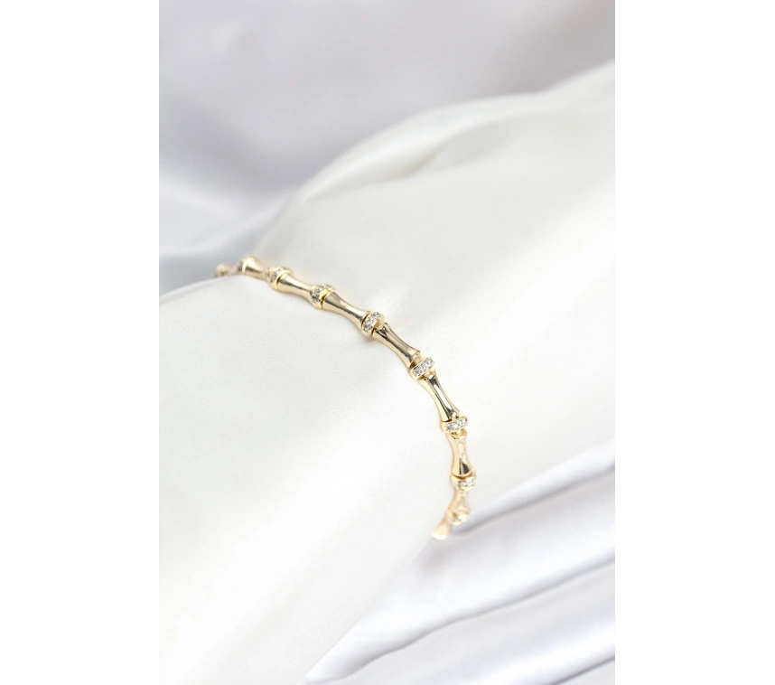 Pirinç Gold Renk Kemik Model Zirkon Taşlı Kadın Bileklik