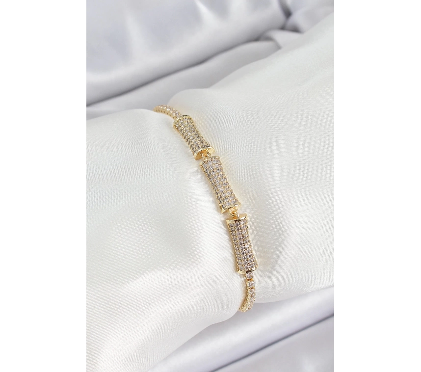 Pirinç Gold Renk Zirkon Taşlı Kemik Model Kadın Bileklik