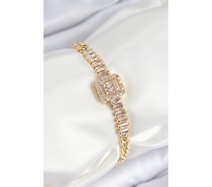 Pirinç Zirkon Taşlı Su Yolu Detaylı Baget Model Gold Renk Kadın Bileklik