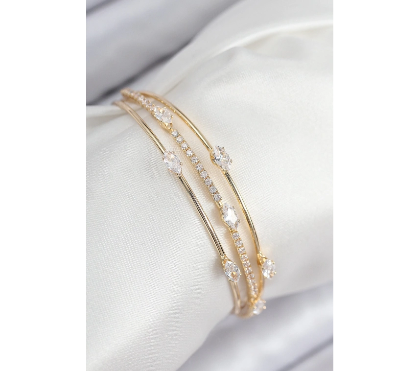 Pirinç Zirkon Taşlı Su Yolu Model Gold Renk Kadın Bileklik