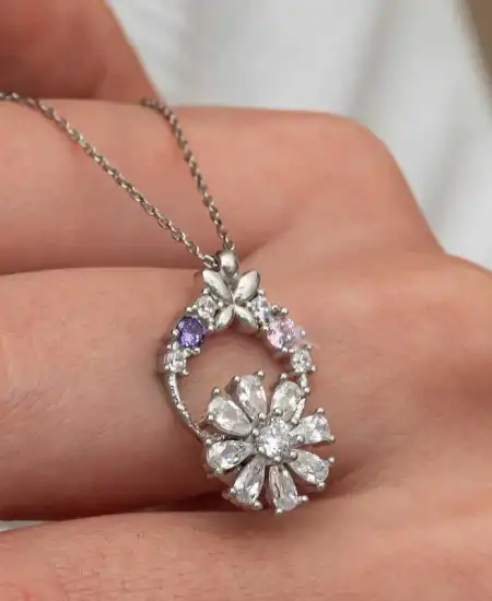 Gümüş Beyaz Dönen Çiçek Kadın Kolye