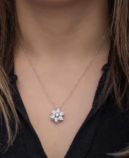 Gümüş Kar Tanesi Dönen Stres Kadın Kolye