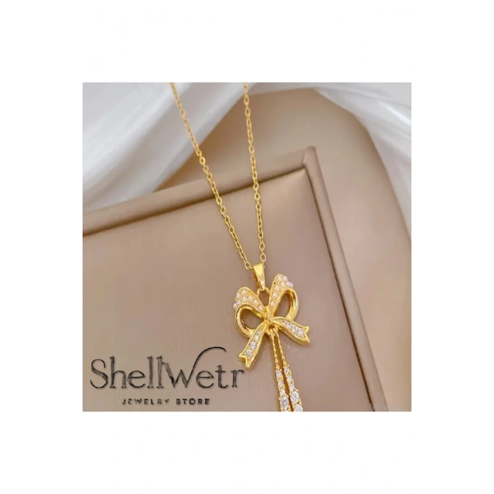 Lumine Kadın altın kaplama kolye-püsküllü fiyonk detaylı taşlı parlak kolye