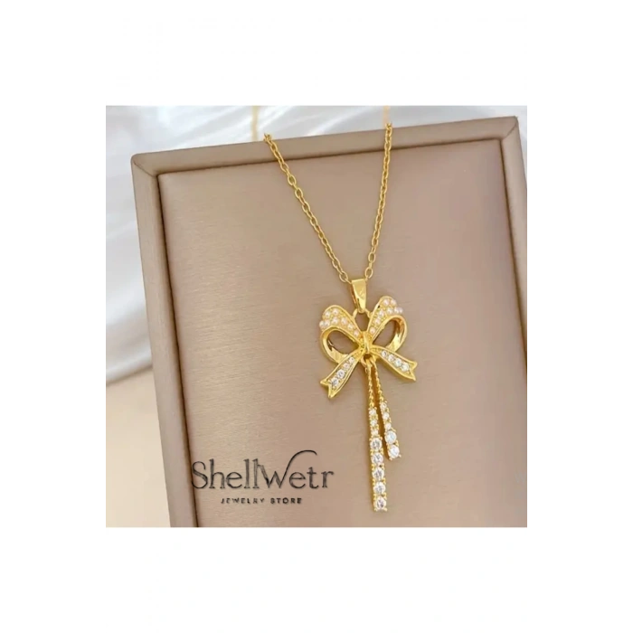 Lumine Kadın altın kaplama kolye-püsküllü fiyonk detaylı taşlı parlak kolye