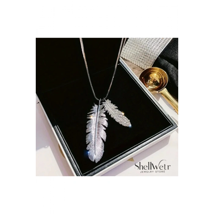 Plume Gümüş kuş tüyü detaylı kadın kolye şans her daim sizinle olsun
