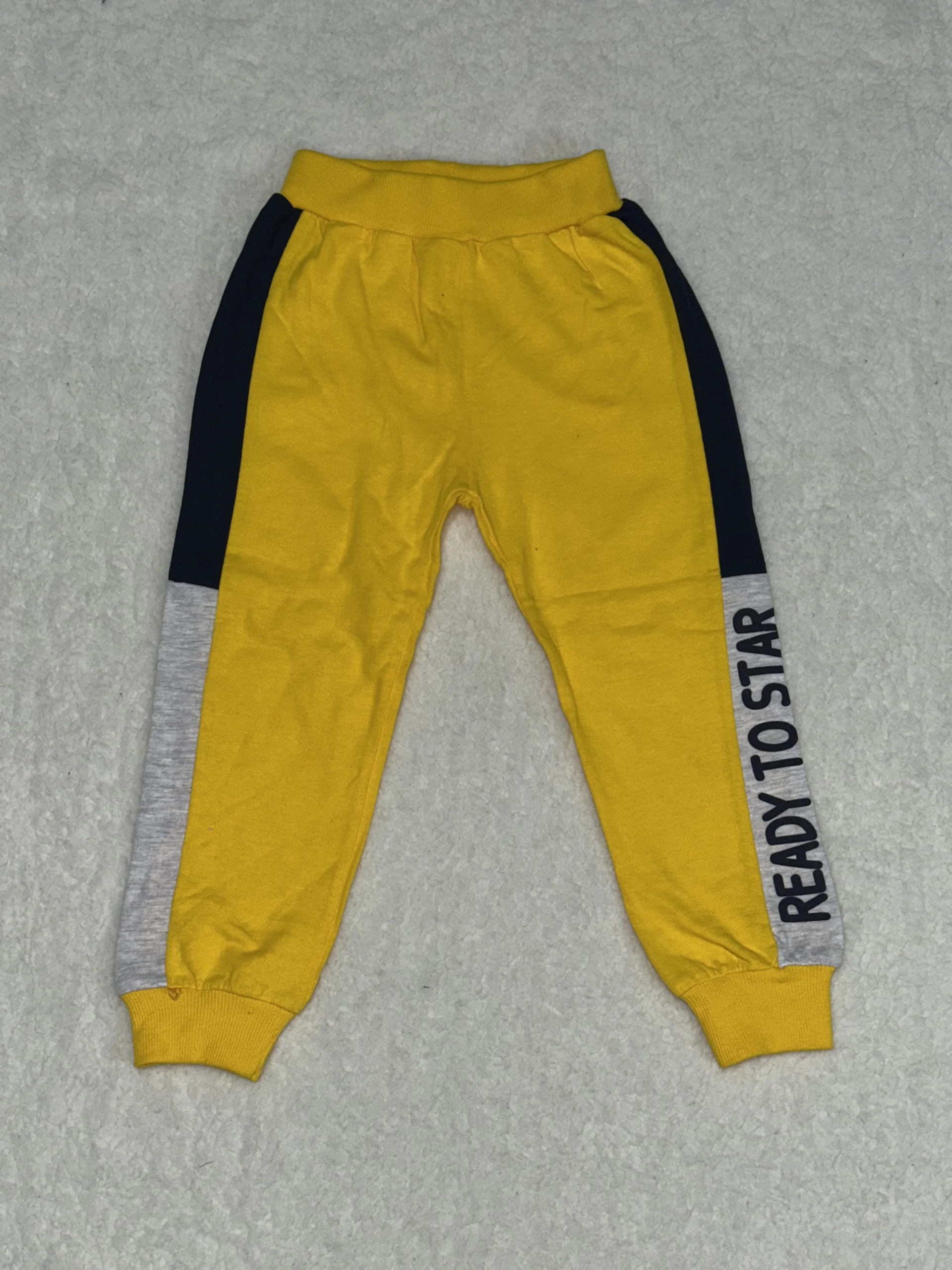 4-6-7 yaş erkek çocuk eşofman diz altı detaylı ek parça sarı