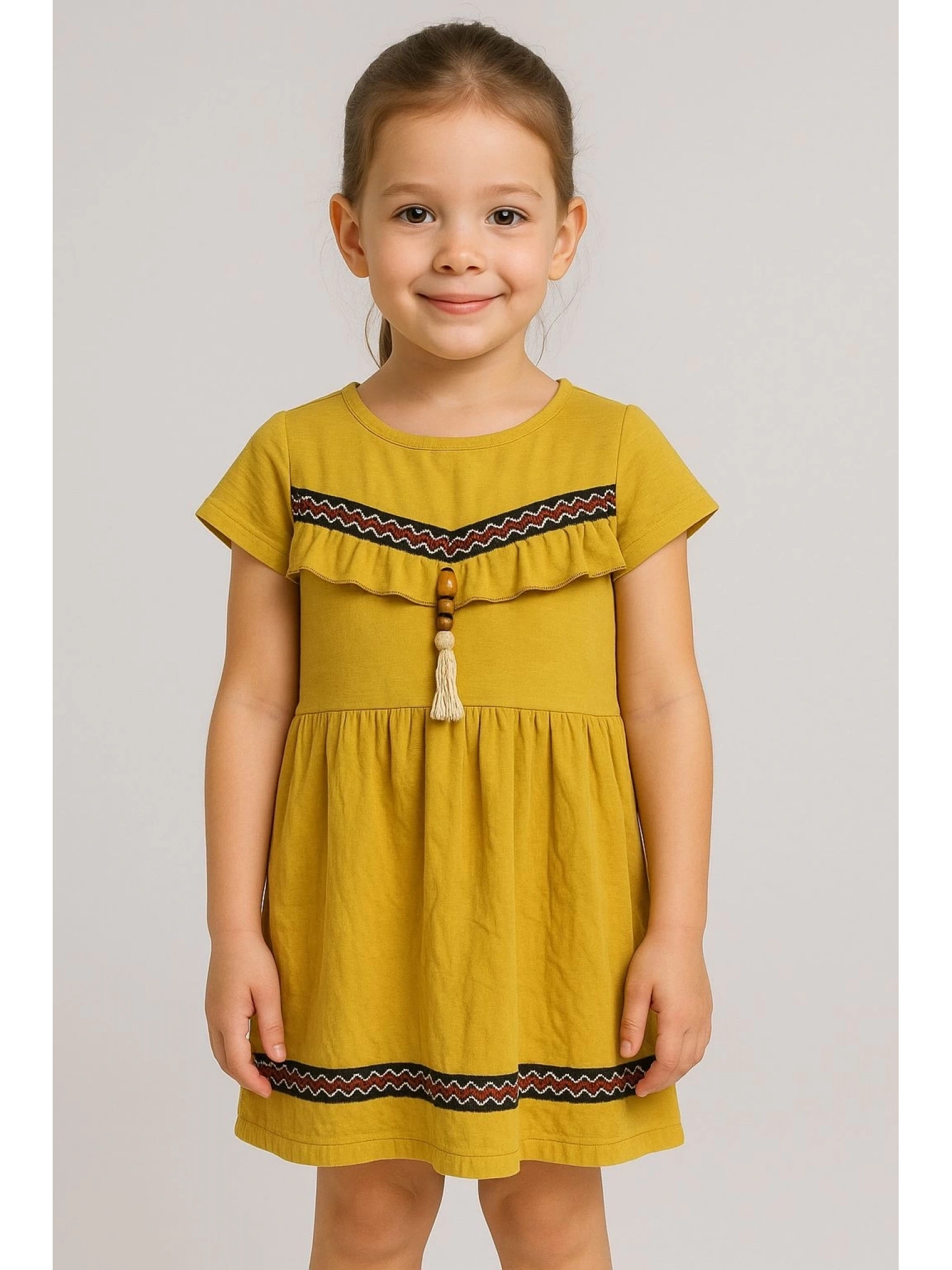 Önü püsküllü boncuk detaylı kız çocuk elbisesi hardal