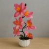 Pembe Yapay Orkide – Plastik Saksıda Dekoratif Aranjman (15×35 cm)