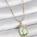 316L Çelik Gold Renk Zincir Mavi Mineli Çiçek İşlemeli Zirkon Taş Detaylı Portre Model Kadın Kolye - Lisinya