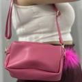 Ponpon fuşya cilt çanta