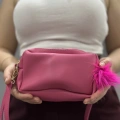 Ponpon fuşya cilt çanta