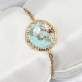 316L Çelik Zincir Turkuaz Mineli Sanatsal Portre İnci Detaylı Çiçek Model Gold Renk Kadın Bileklik - Lisinya