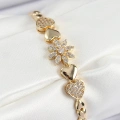 Pirinç Zirkon Taşlı Kalp Detaylı Çiçek Model Gold Renk Kadın Bileklik - Lisinya