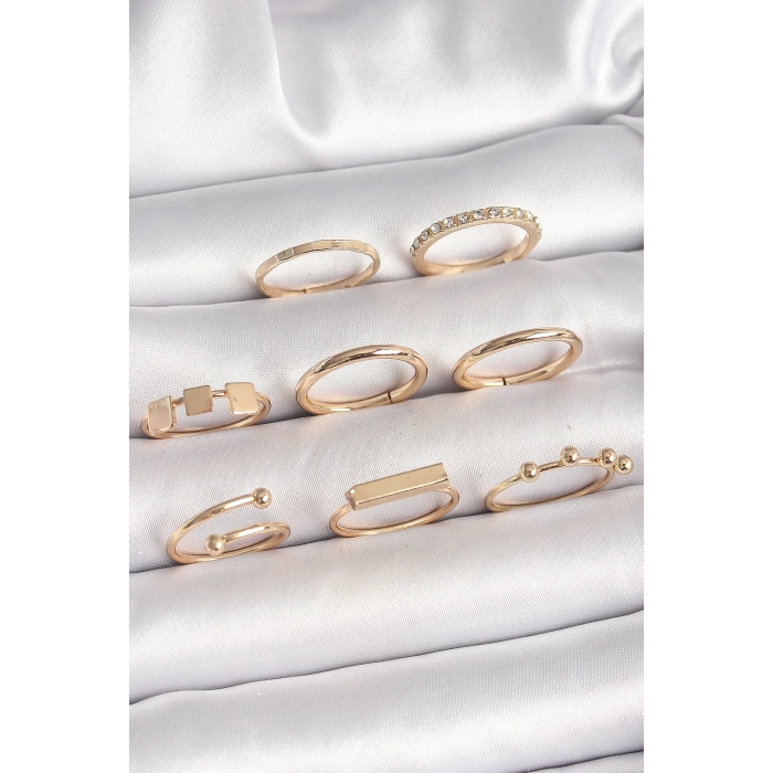 Pirinç Gold Renk Goemetrik Sembol Model Zirkon Taş Detaylı Kadın Yüzük Kombini