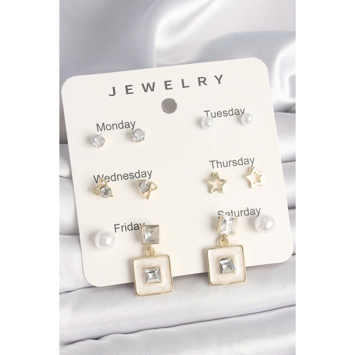 Pirinç Gold Renk Zirkon Taşlı Yıldız Figür Sallantı Beyaz Mineli Model 7Li Kadın Küpe Seti