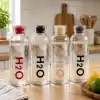 Orret Home 1000 ml Renkli Kapaklı Borosilikat Cam Matara – Sızdırmaz Çevirmeli Vakumlu Kapaklı Suluk,BPA İçermez, Isıya Dayanıklı, Geniş Ağızlı, Şık ve Dayanıklı Cam Su Şişesi (Siyah)