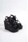 Siyah Rugan Kadın Dolgu Topuk Çapraz Biyeli Sandalet