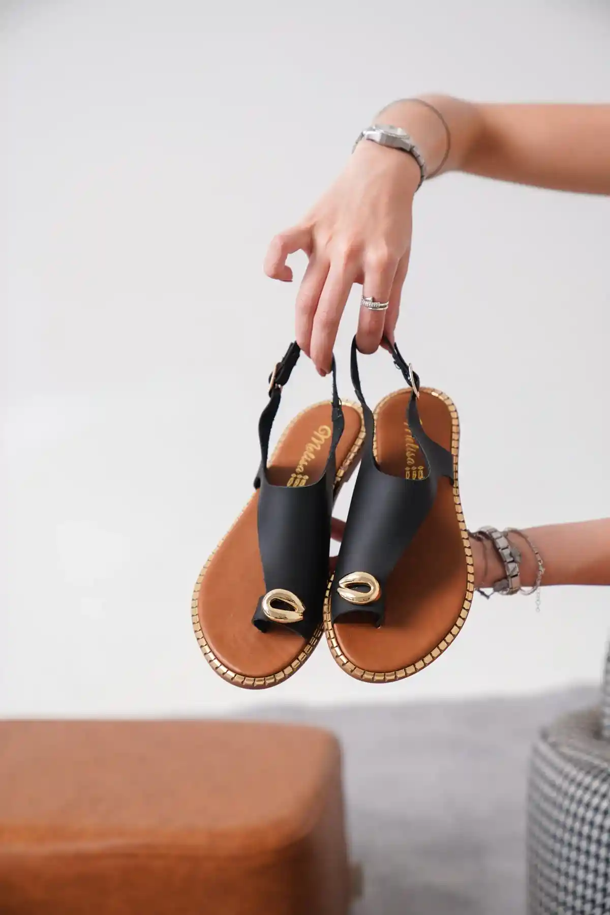 Black Leather Womens Toe Ring Sandal with Ring Detail and Gold Buckle