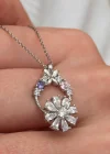 Gümüş Beyaz Dönen Çiçek Kadın Kolye