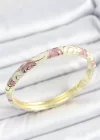 Mineli Pirinç Pembe Bej Sarmal Desenli Gold Renk Kadın Kelepçe