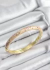 Mineli Pirinç Pembe Ve Yavru Ağzı Çiçek Motifli Gold Renk Kadın Kelepçe