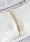 Pirinç Gold Renk Zirkon Taşlı Kemik Model Kadın Bileklik