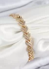 Pirinç Zirkon Taşlı Sıralı Ok Model Gold Renk Kadın Bileklik