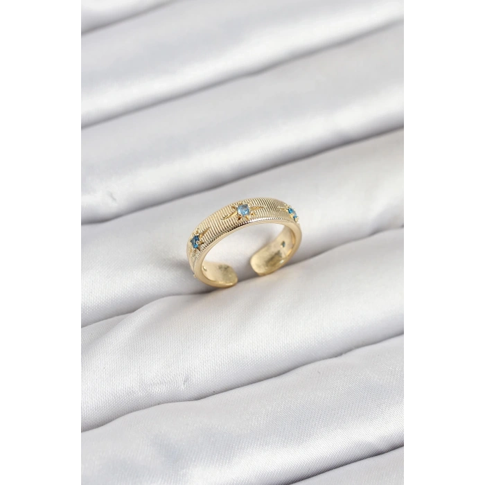 Pirinç Gold Renk Mavi Zirkon Taşlı Kutup Yıldızı Model Kadın Yüzük